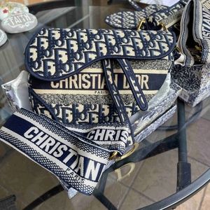 Dior saddle bag with shoulder strap with ring